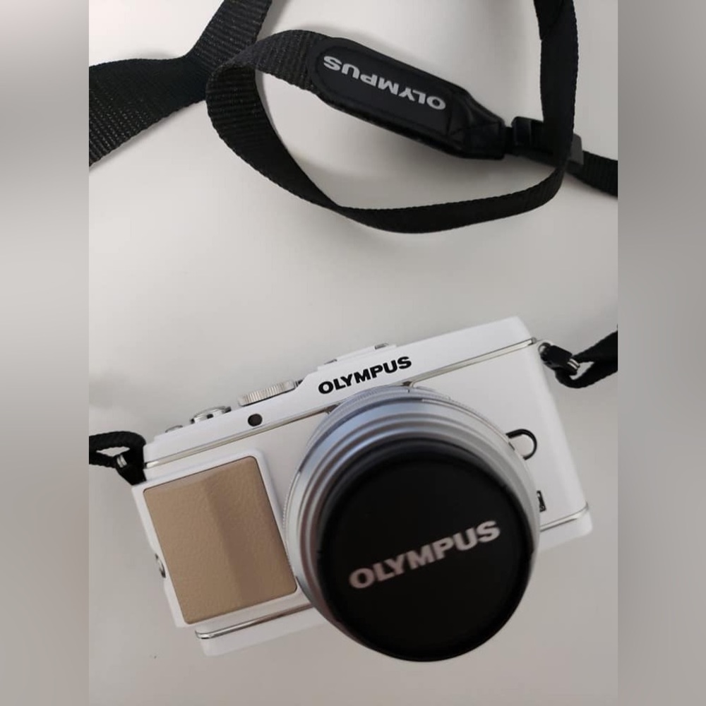 **Mint** Olympus Ep-3 with 14-42mm lens